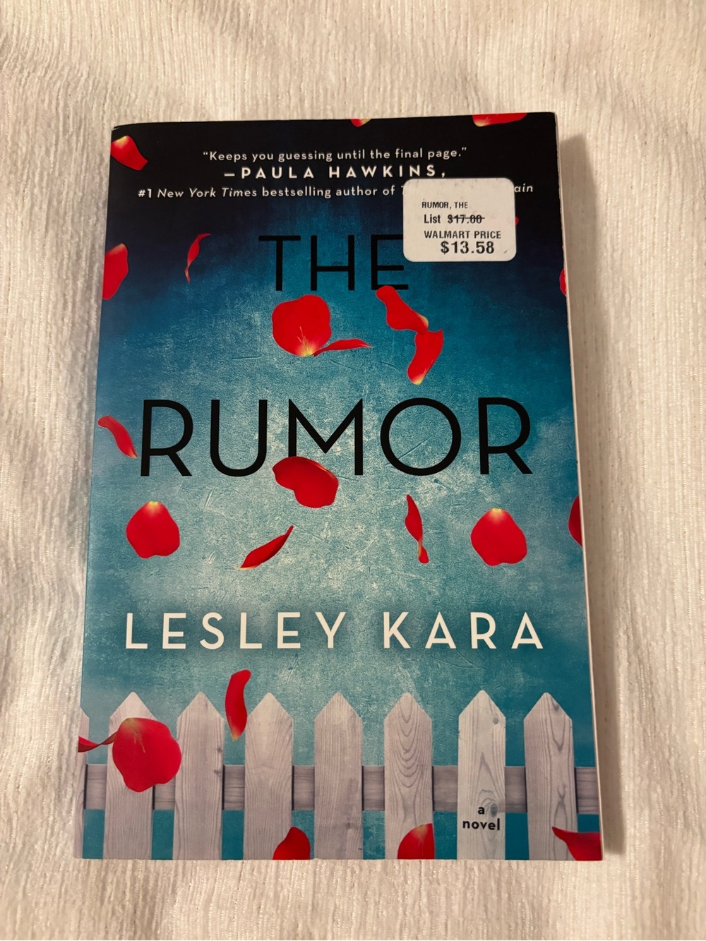 The Rumor by Lesley Kara - Blue Cover with Red Petals